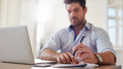 5 types of technical writing business-man-at-home-office-writing-technical-documentation